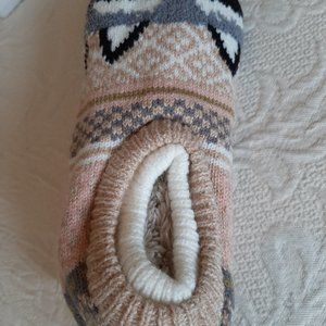 bundle of sock slippers and 3 pairs of goose socks